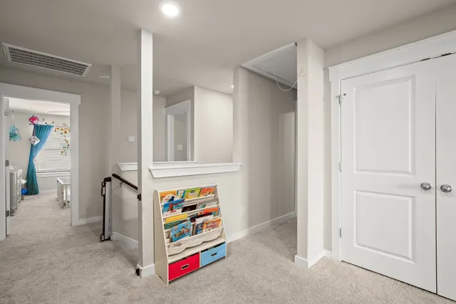 a room that has a bed and a window