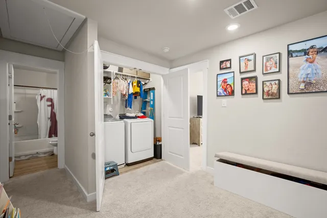 a view of a hallway with shelves