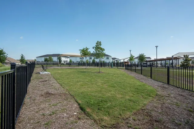 a view of a backyard with a garden