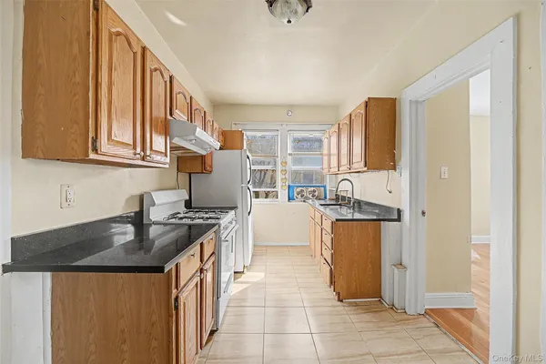 $1,599,000 | 87-15 58th Avenue | Elmhurst