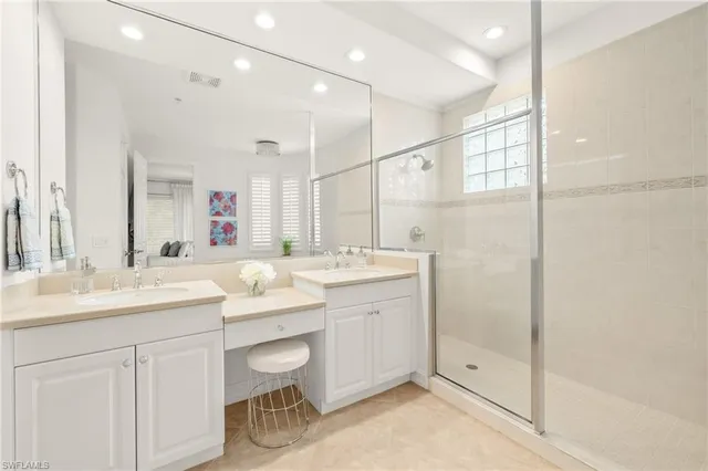 a bedroom with a bed and a desk