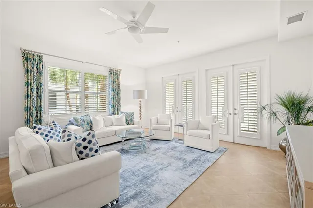 a kitchen with stainless steel appliances granite countertop stove a sink and a refrigerator