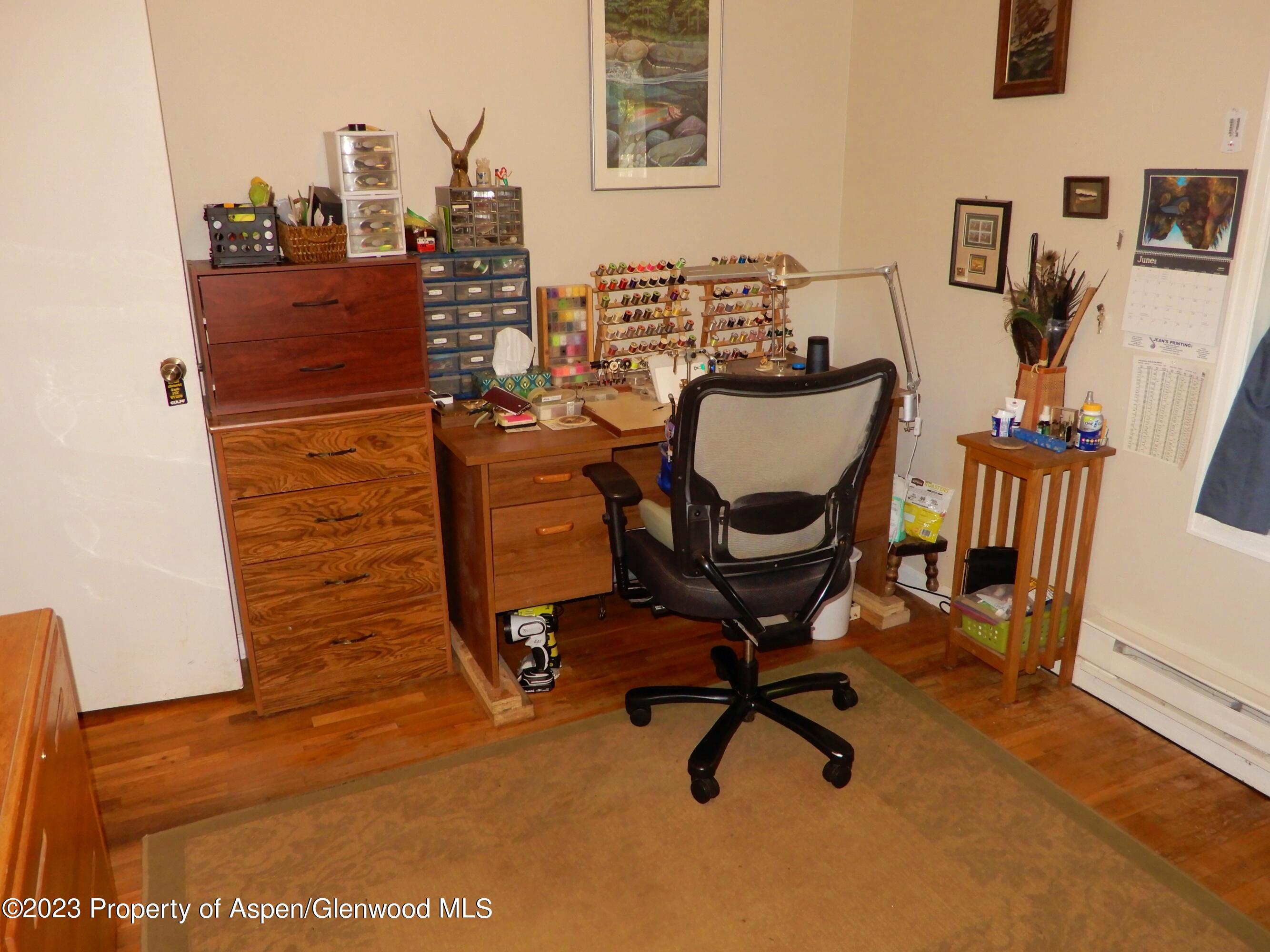 129 East 11th Street Rifle, CO 81650 - Photo 14 of 24 a view of a workspace with furniture