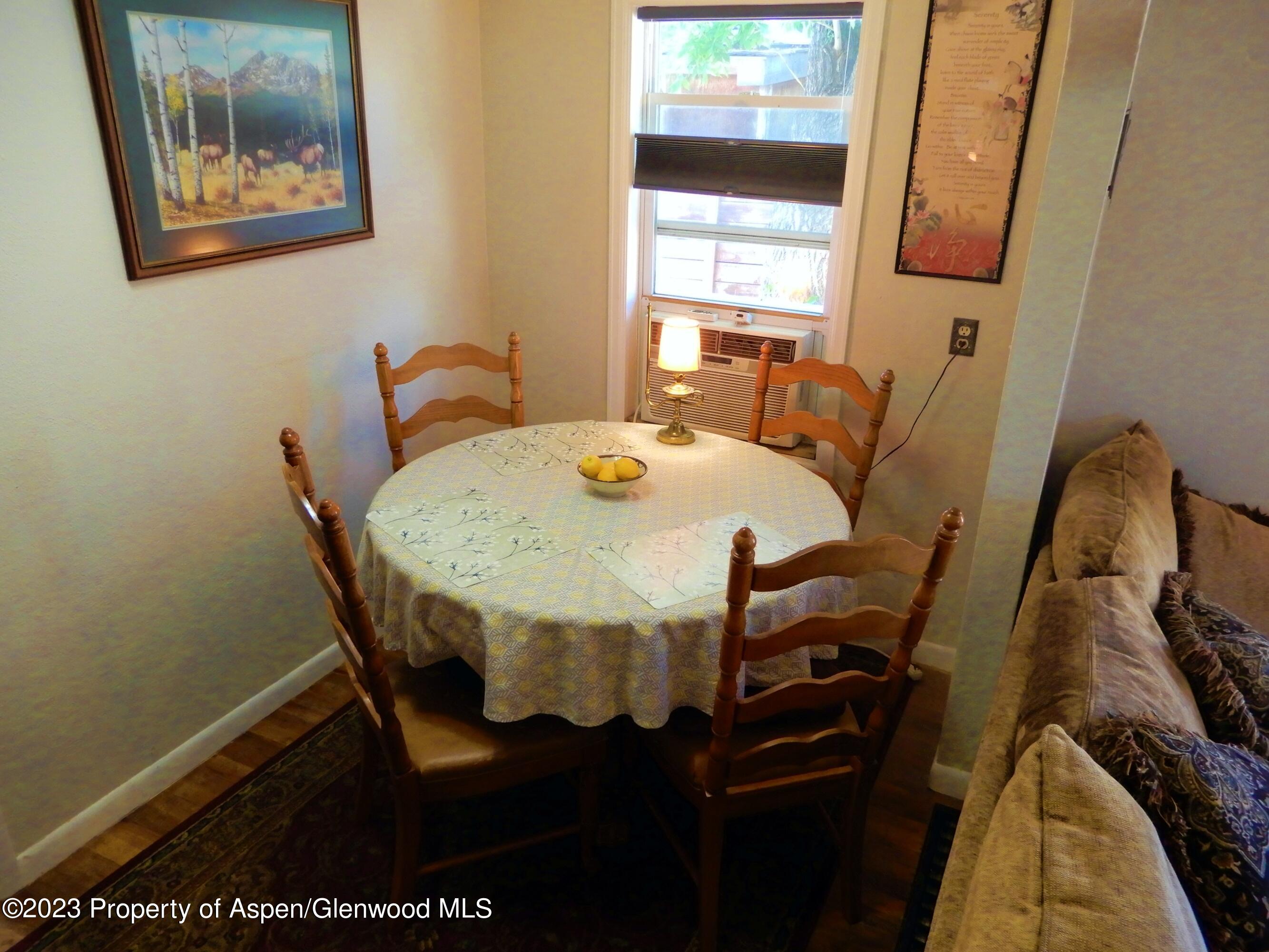 129 East 11th Street Rifle, CO 81650 - Photo 5 of 24 a dining room with furniture and window