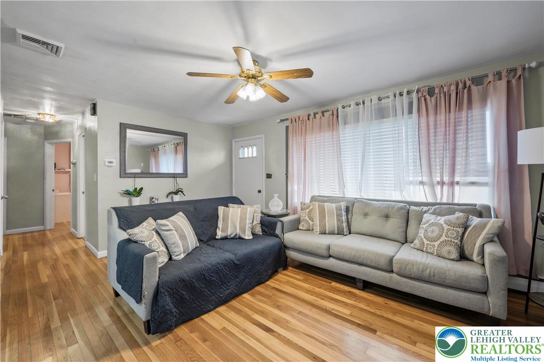 148 North 8th Street Coplay, PA 18037 - Photo 15 of 45 a living room with furniture and a large window