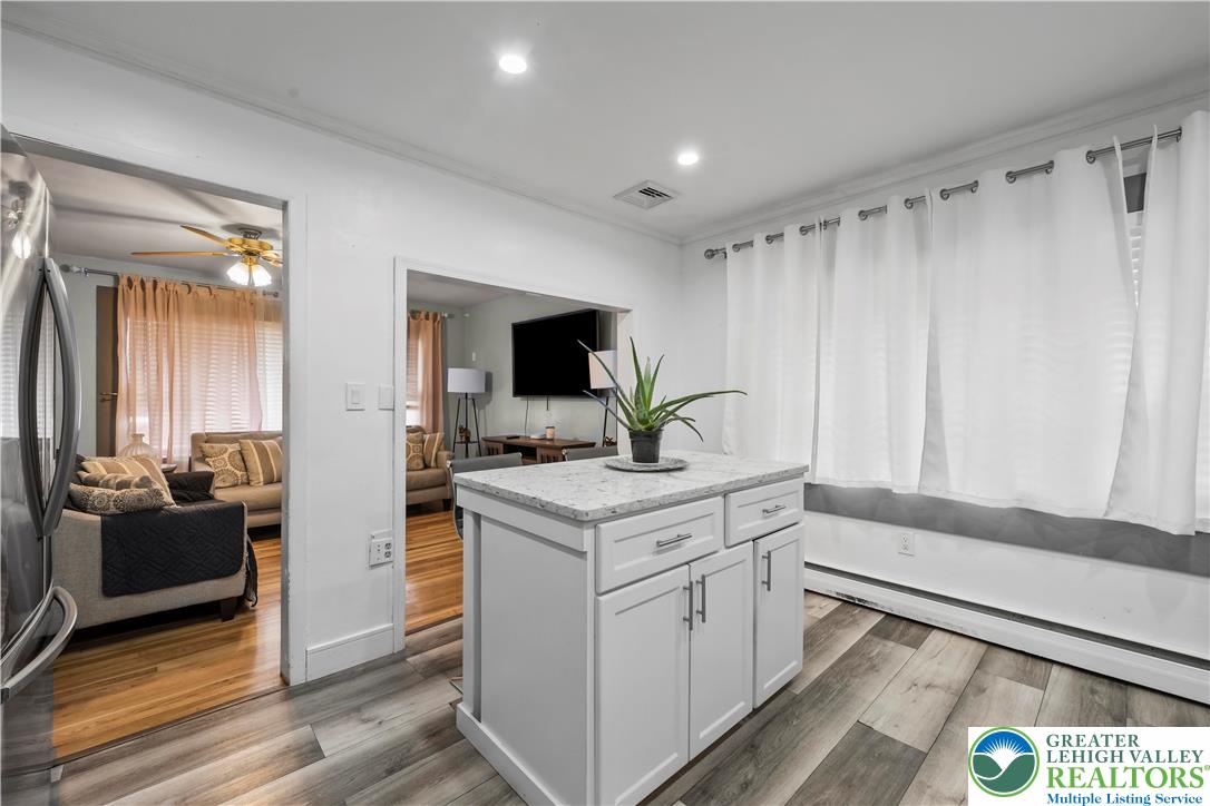 148 North 8th Street Coplay, PA 18037 - Photo 18 of 45 a kitchen with a stove and a microwave