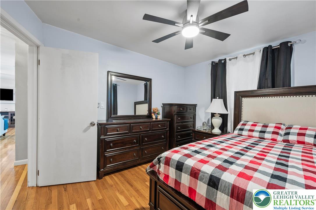 148 North 8th Street Coplay, PA 18037 - Photo 28 of 45 a bedroom with a bed and a dresser