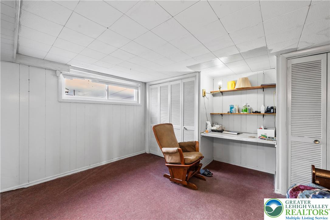 148 North 8th Street Coplay, PA 18037 - Photo 35 of 45 a room with a chair and white walls