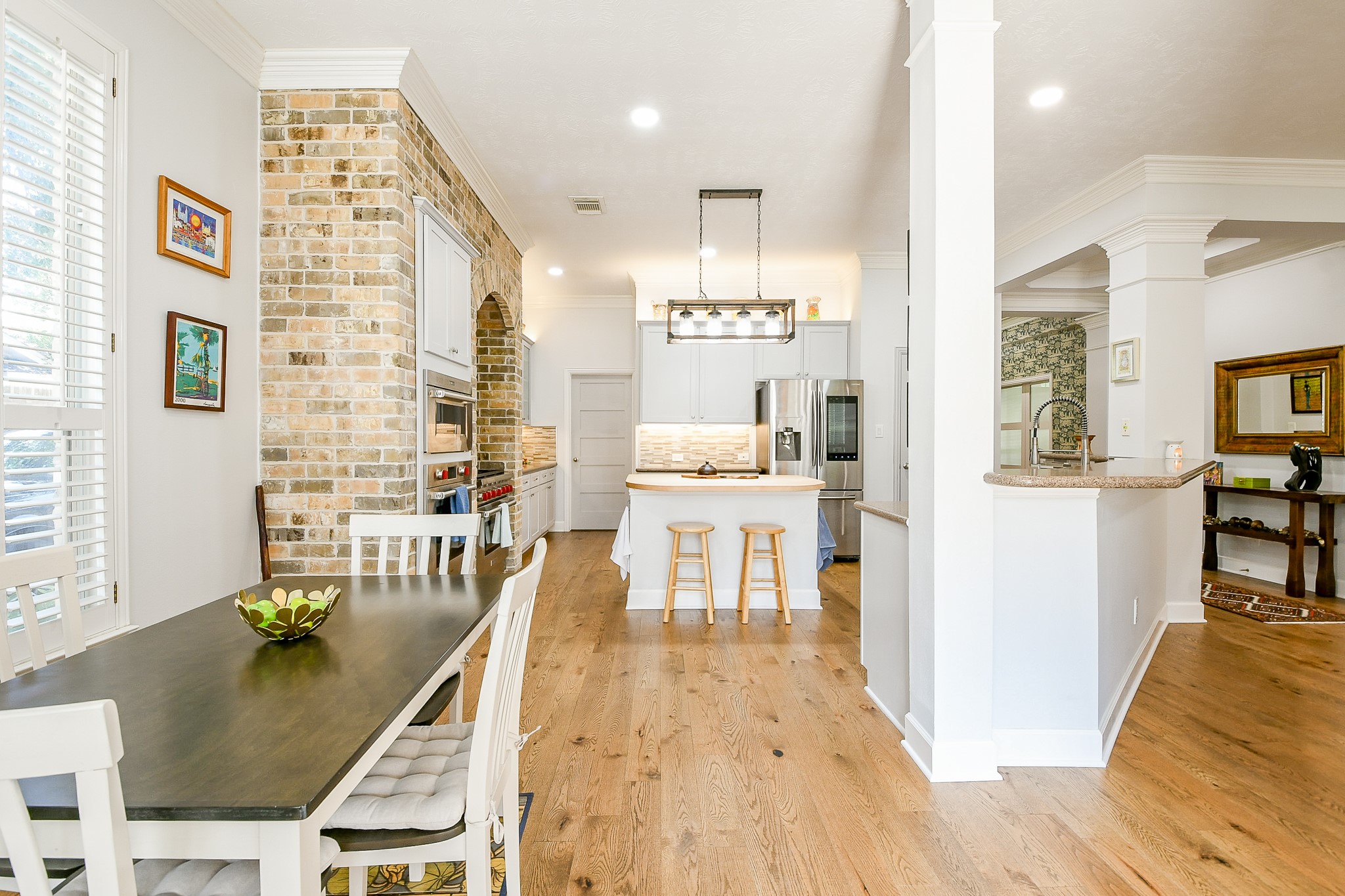 2442 Chimney Rock Road Houston, TX 77057 - Photo 17 of 50 a living room with furniture and a table