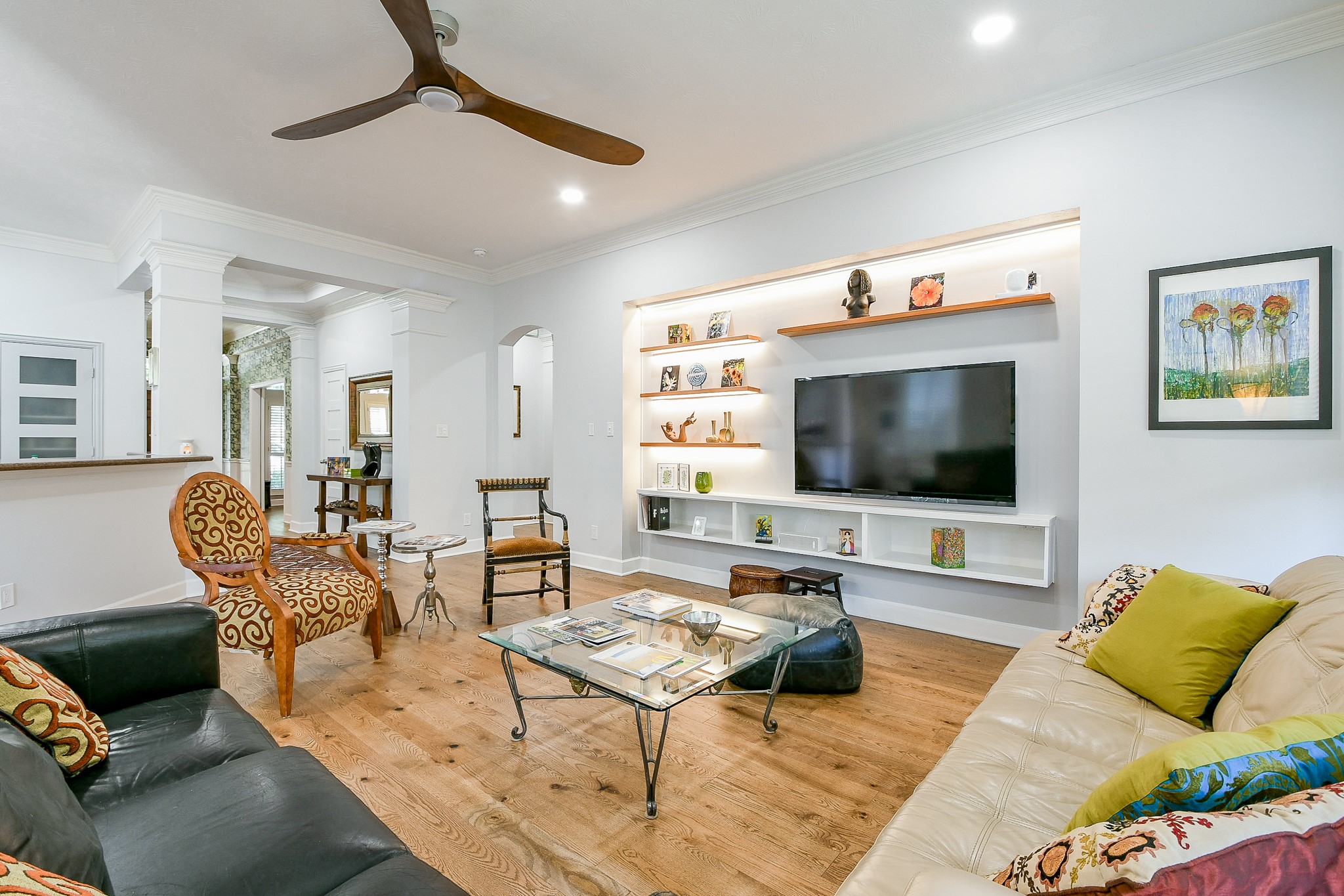 2442 Chimney Rock Road Houston, TX 77057 - Photo 22 of 50 a living room with furniture and a flat screen tv