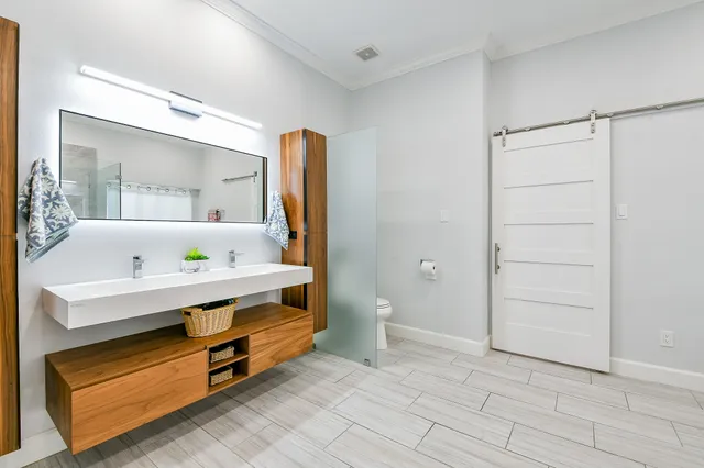 a view of room with closet and fan