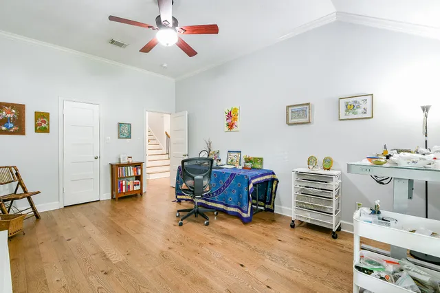 a bedroom with a workspace