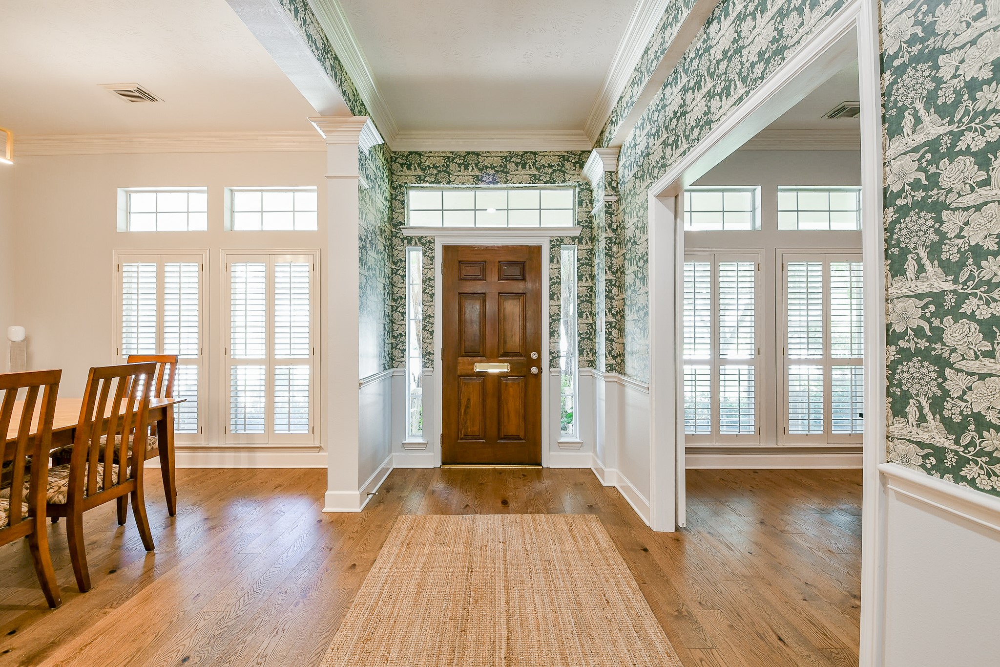 2442 Chimney Rock Road Houston, TX 77057 - Photo 5 of 50 a view of a room with wooden floor and windows