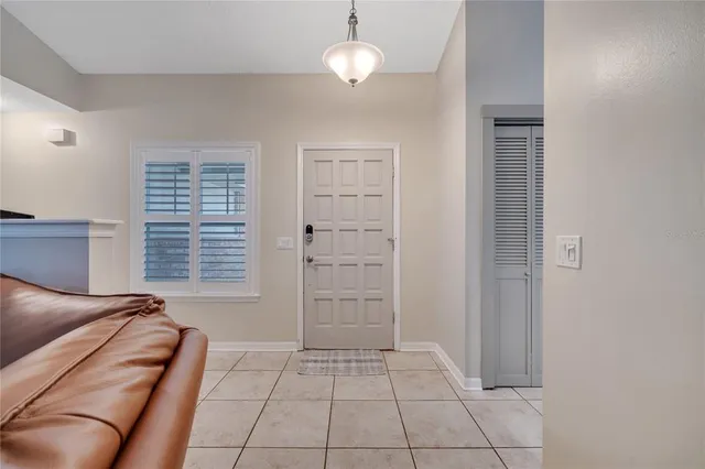 a view of room with cabinet and stairs