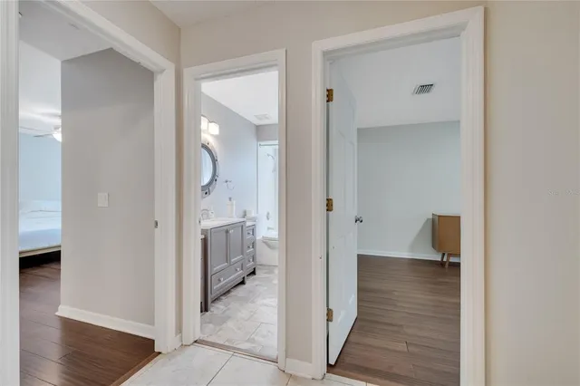 a view of a bathroom from the hallway