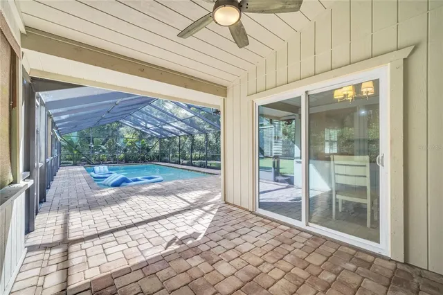 a view of a porch with a floor to ceiling window