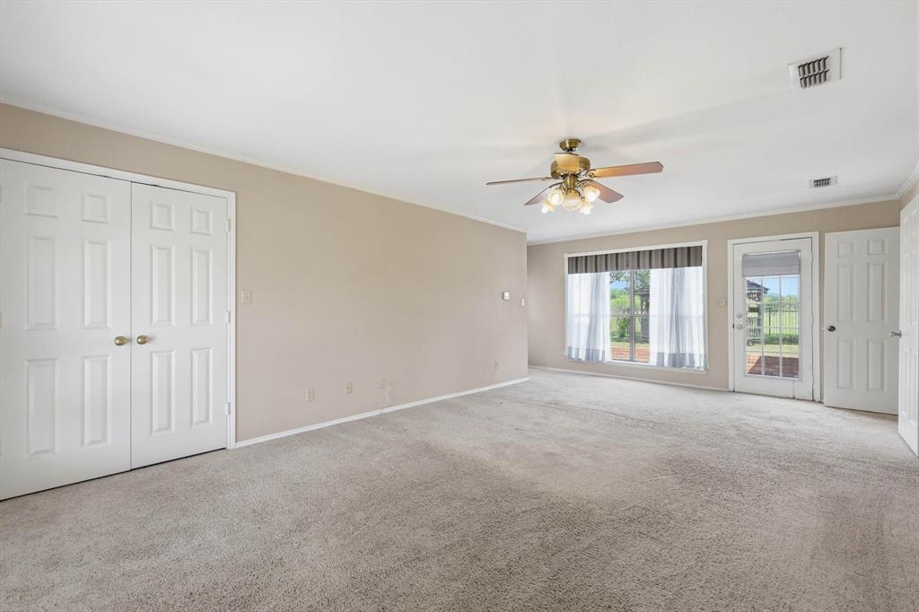 211 Bayne Road Haslet, TX 76052 - Photo 15 of 29 a view of an empty room with a window