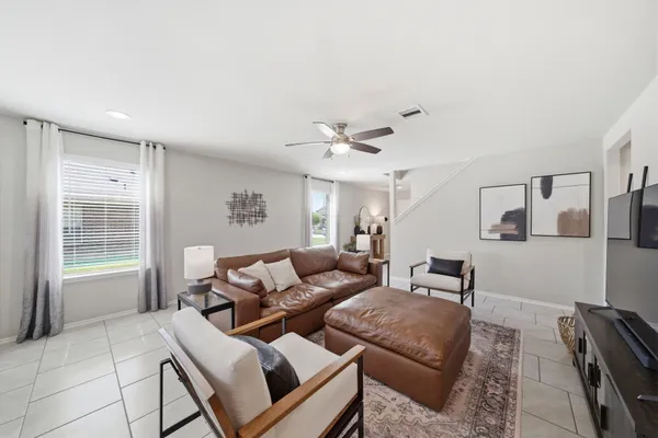 a living room with furniture and a window