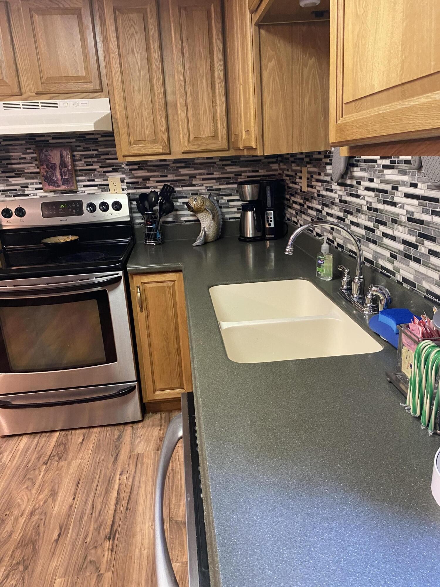 321 Pawnee Lane Decatur, TN 37322 - Photo 29 of 32 a kitchen with a sink and cabinets
