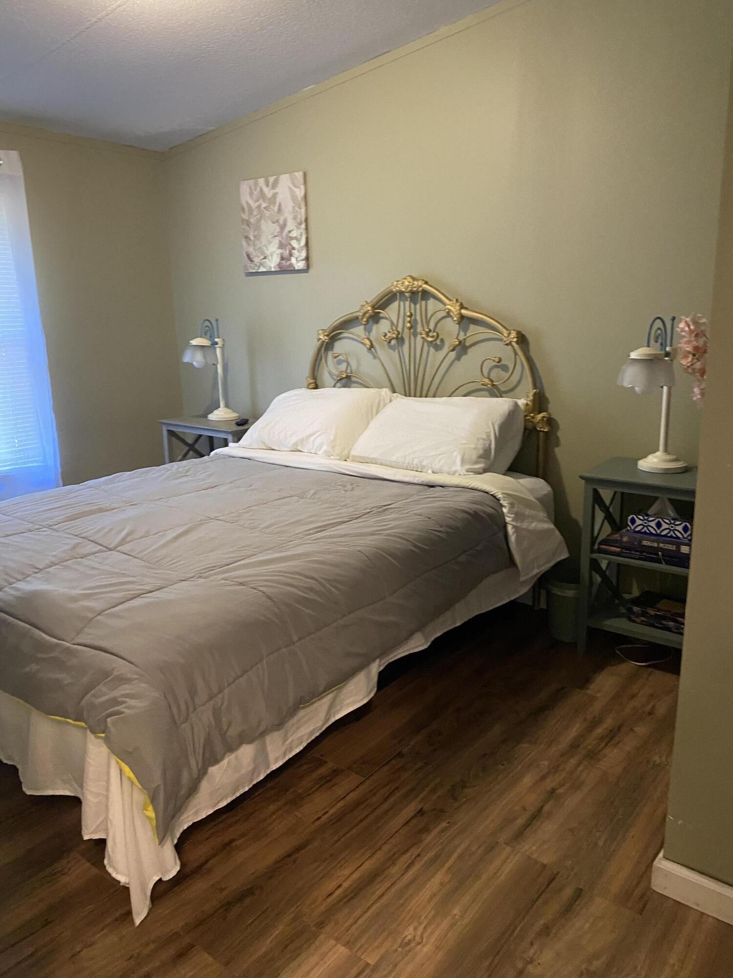 321 Pawnee Lane Decatur, TN 37322 - Photo 8 of 32 a bedroom with a bed and a table