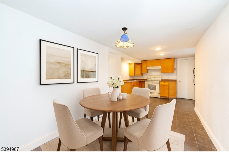 233 Lakeside Avenue Hopatcong, NJ 07821 - Photo 9 of 9 a view of a dining room with furniture and a table