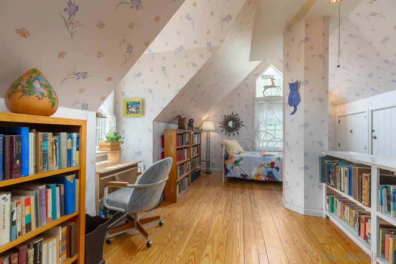 3754 Pine Hills Road Julian, CA 92036 - Photo 20 of 39 a living room with furniture and a book shelf