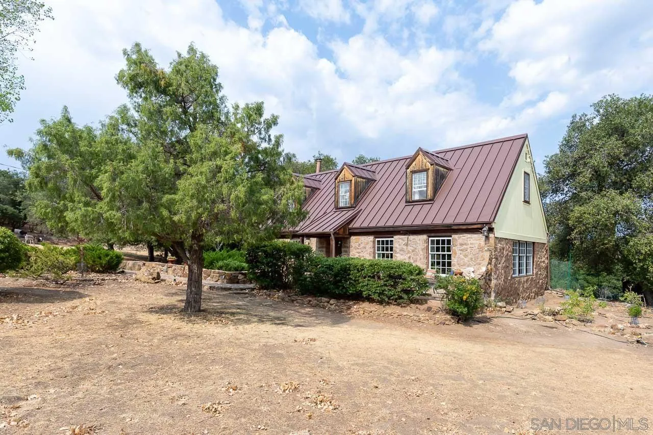 3754 Pine Hills Road Julian, CA 92036 - Photo 22 of 39 a front view of house with yard and trees around