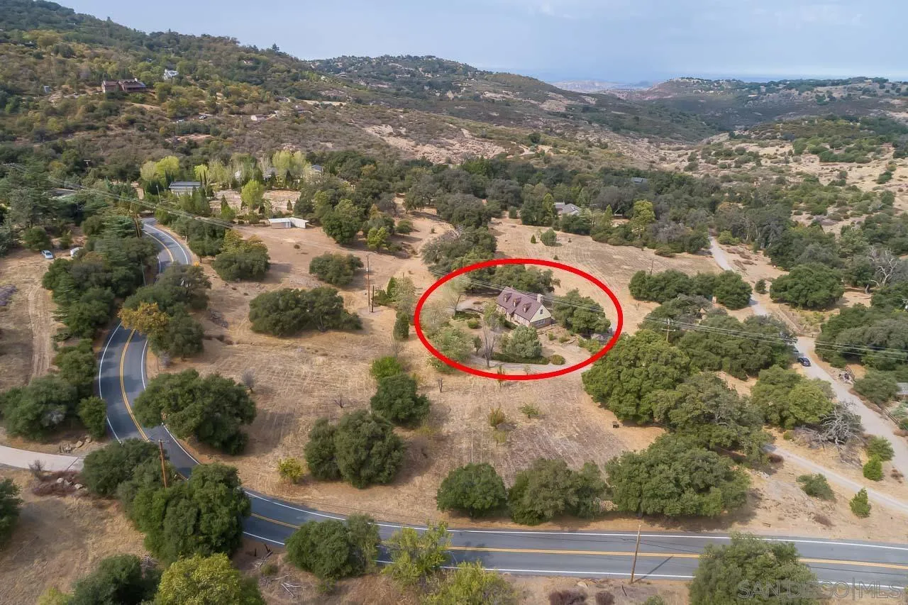 3754 Pine Hills Road Julian, CA 92036 - Photo 27 of 39 an aerial view of a house with a yard and lake view