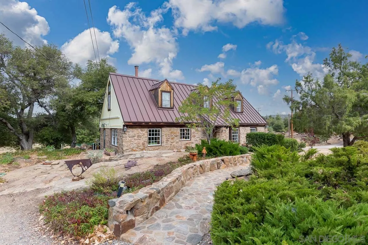 3754 Pine Hills Road Julian, CA 92036 - Photo 3 of 39 a pathway of a house with a yard