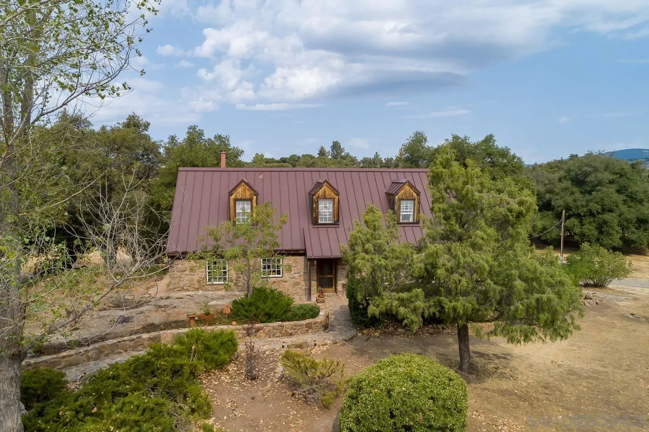 3754 Pine Hills Road Julian, CA 92036 - Photo 4 of 39 an aerial view of a house with a yard and large tree