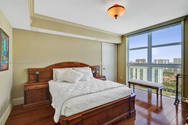 a bedroom with a bed and furniture