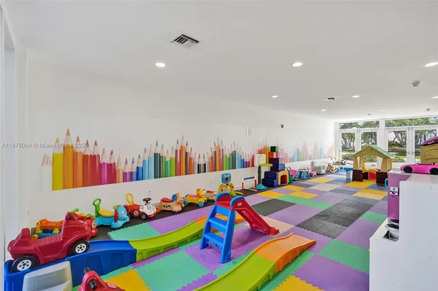 a living room with furniture and a yard