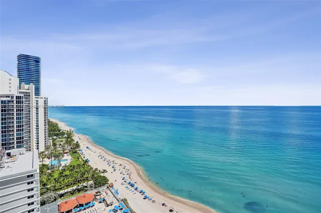 a view of a lake with a yard