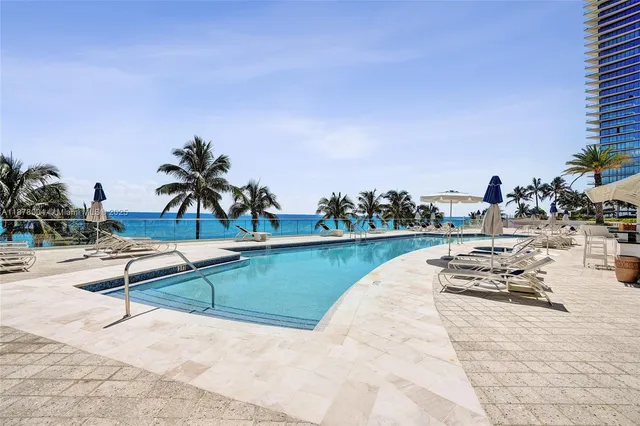 a view of swimming pool from a outdoor space