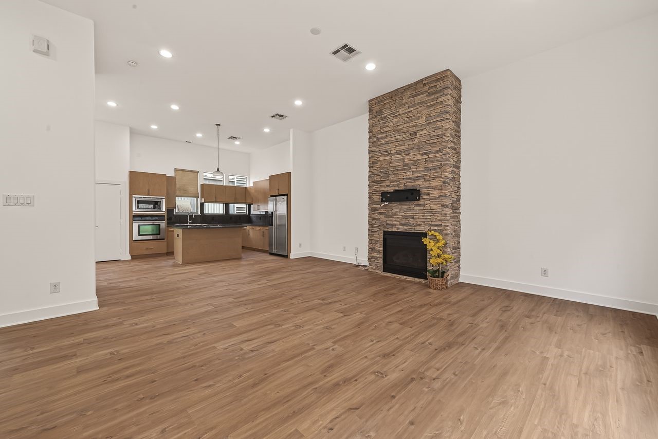 724 Ruthven Street Houston, TX 77019 - Photo 25 of 45 a view of kitchen and hall with wooden floor