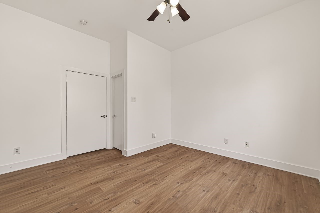724 Ruthven Street Houston, TX 77019 - Photo 28 of 45 wooden floor in an empty room