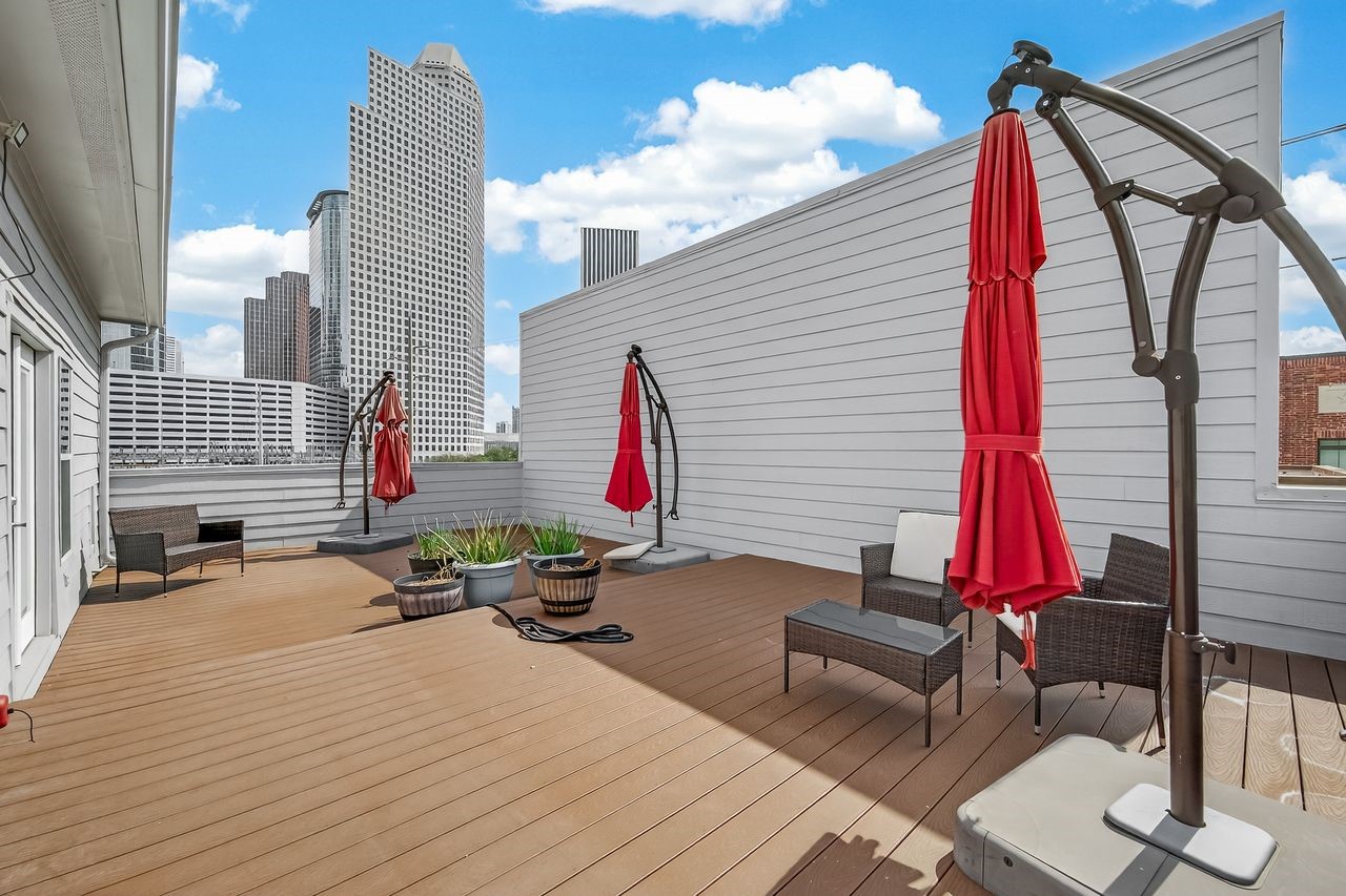 724 Ruthven Street Houston, TX 77019 - Photo 45 of 45 a view of a terrace with sitting area