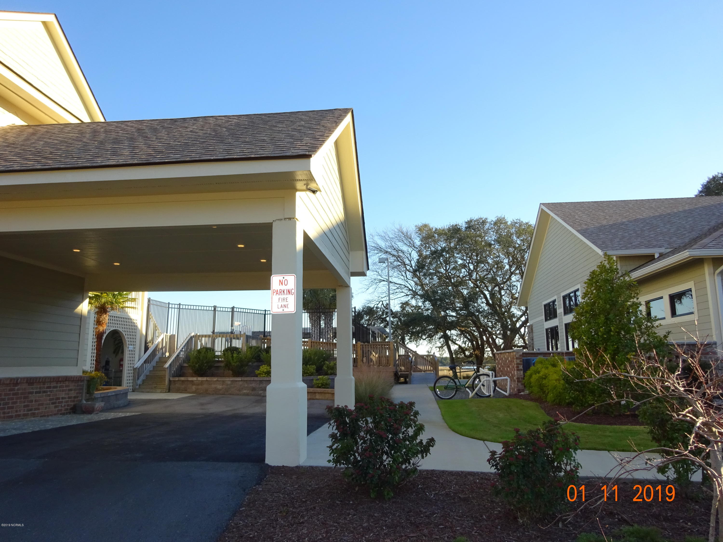 115 Genoe's Point Road Southwest Supply, NC 28462 - Photo 22 of 73 Entrance to Pool