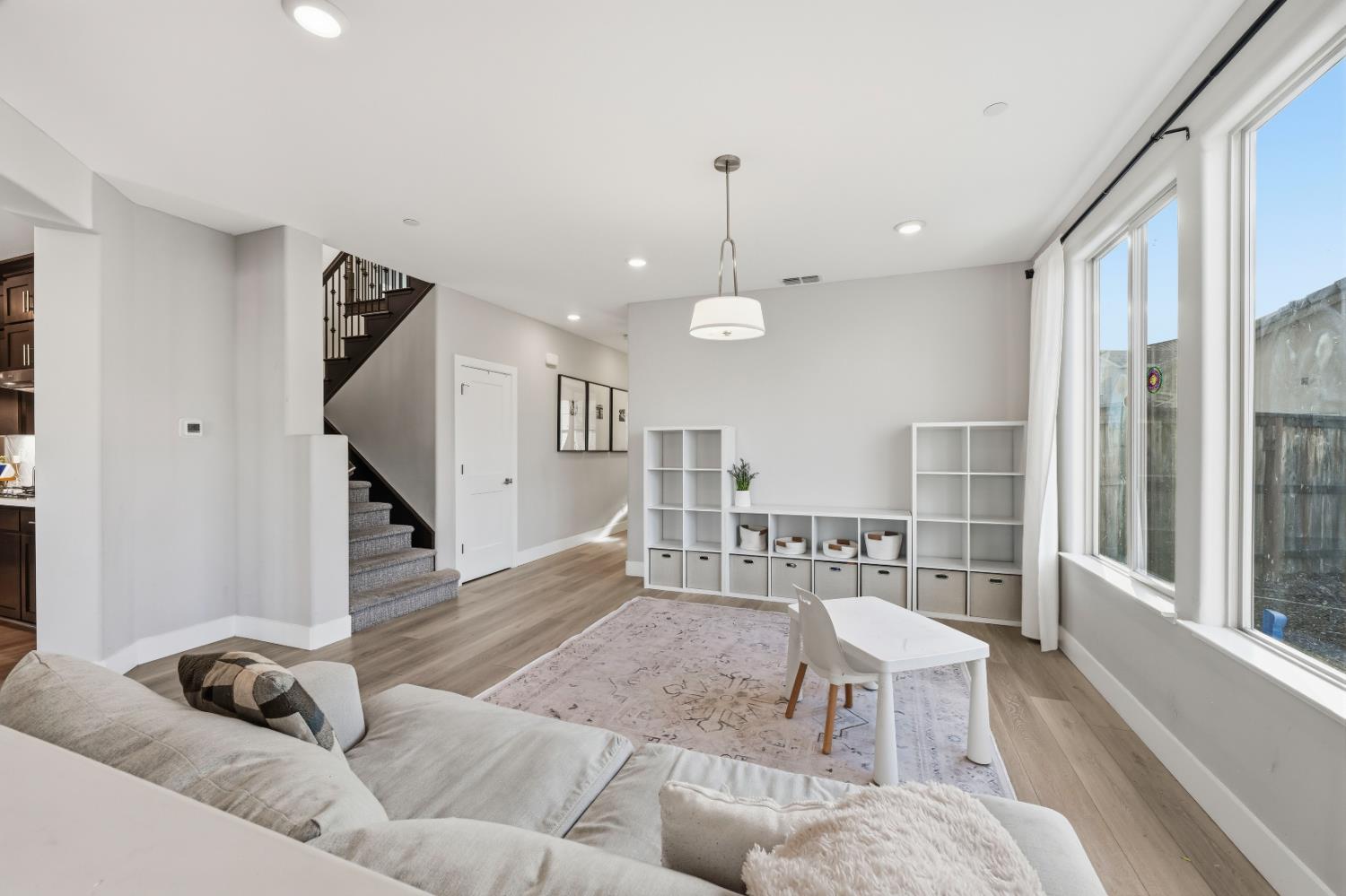 810 Broken Bit Court Rocklin, CA 95765 - Photo 15 of 47 a living room with furniture and a wooden floor