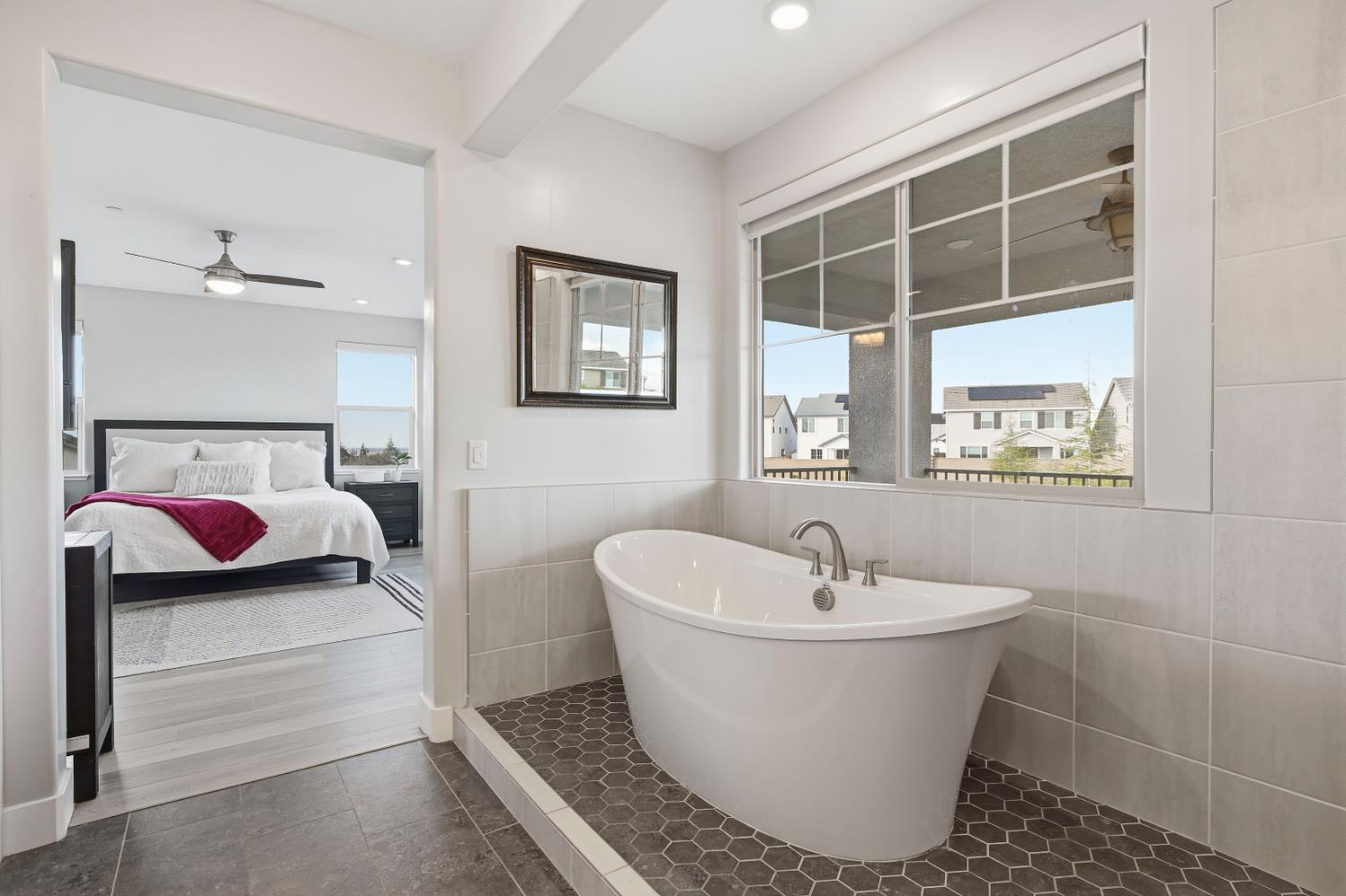 810 Broken Bit Court Rocklin, CA 95765 - Photo 26 of 47 a white bath tub sitting next to a white sink