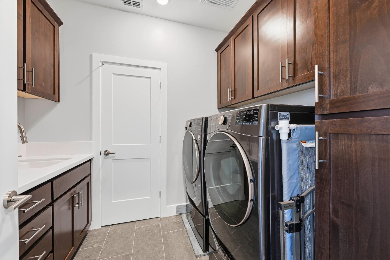 810 Broken Bit Court Rocklin, CA 95765 - Photo 32 of 47 a utility room with dryer and washer