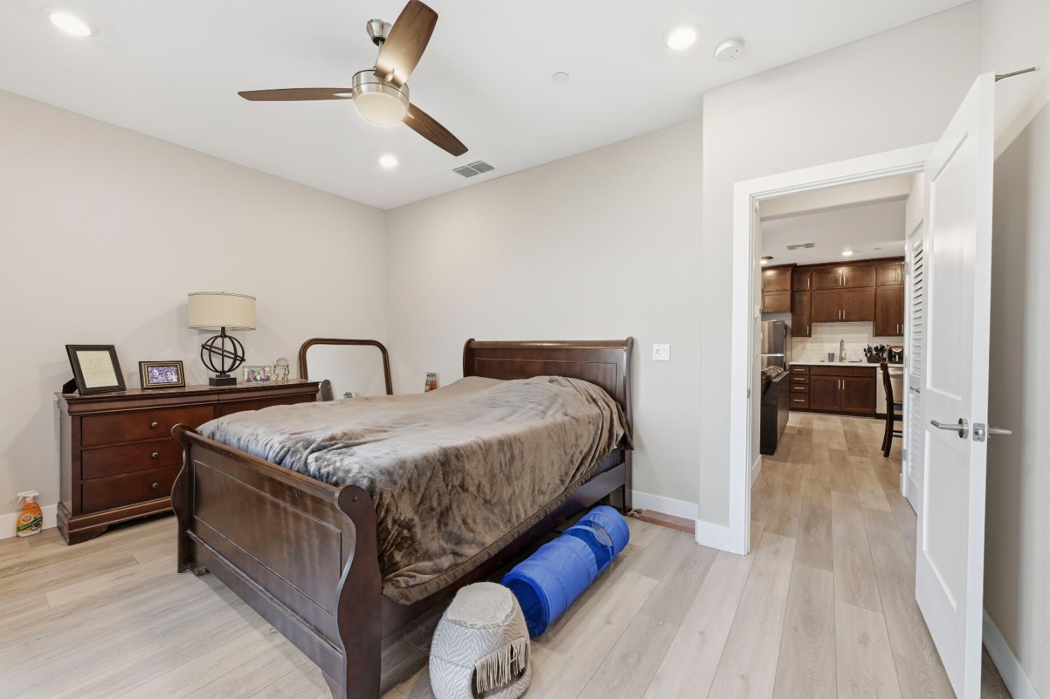 810 Broken Bit Court Rocklin, CA 95765 - Photo 38 of 47 a spacious bedroom with a bed and a table