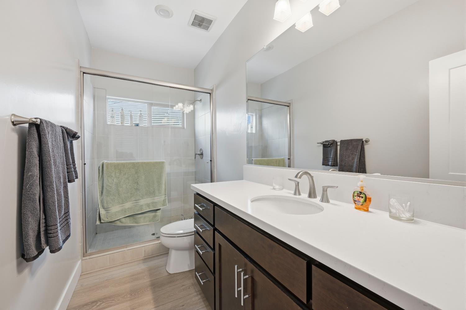 810 Broken Bit Court Rocklin, CA 95765 - Photo 39 of 47 a bathroom with a sink a toilet and shower