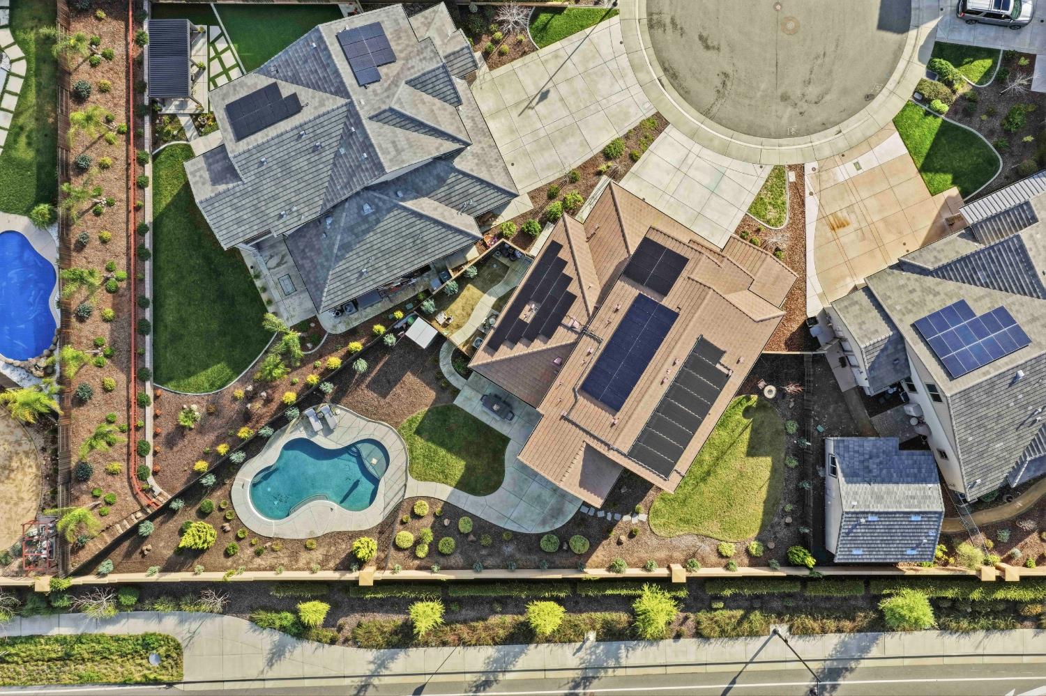 810 Broken Bit Court Rocklin, CA 95765 - Photo 9 of 47 an aerial view of a house with a swimming pool