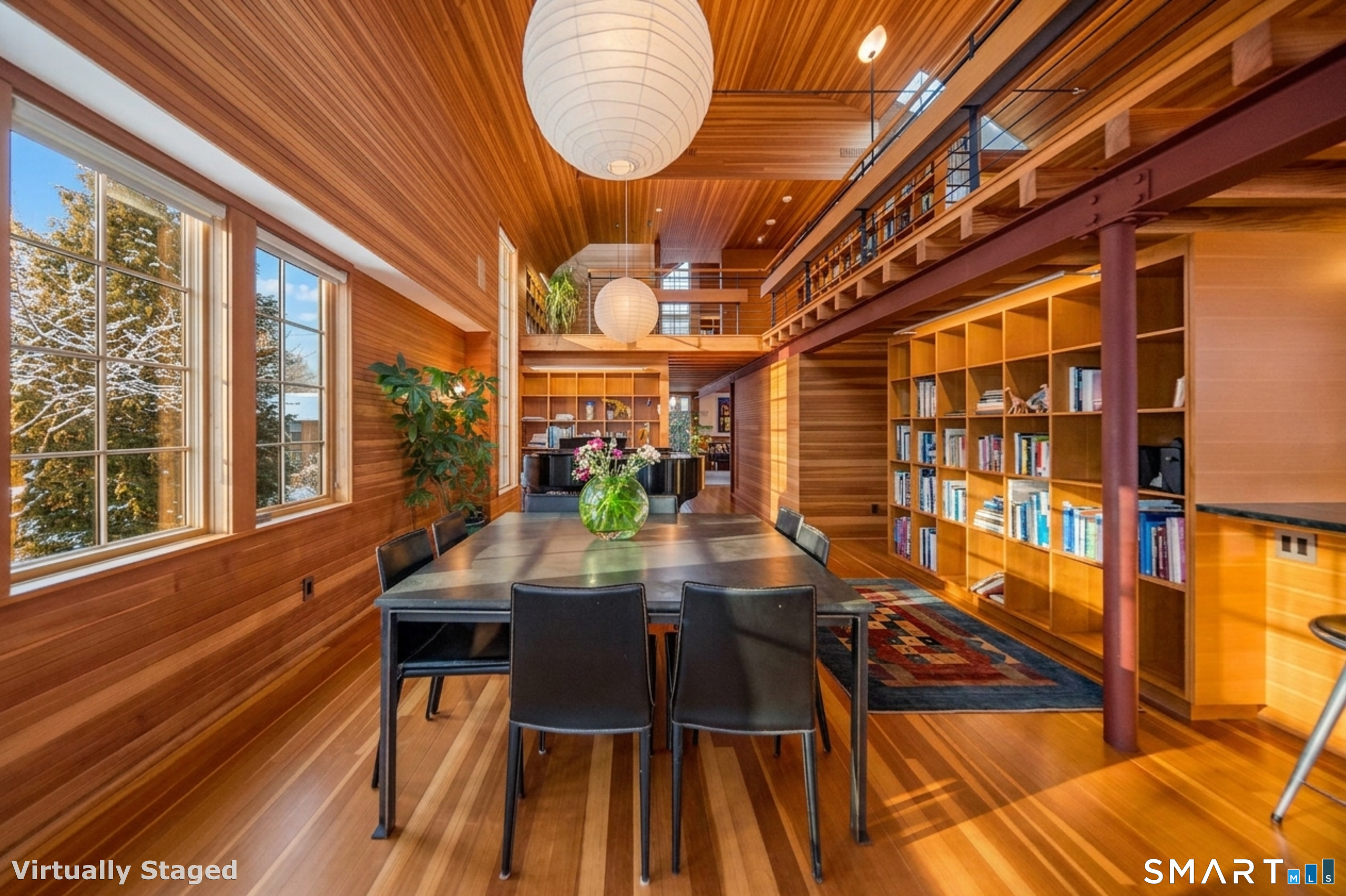 61 Hartford Avenue Madison, CT 06443 - Photo 12 of 75 a dining room with furniture a rug and wooden floor
