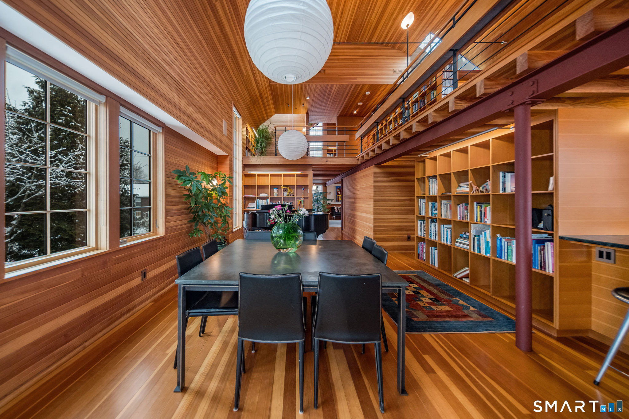 61 Hartford Avenue Madison, CT 06443 - Photo 15 of 75 a view of a dining room with furniture window and wooden floor