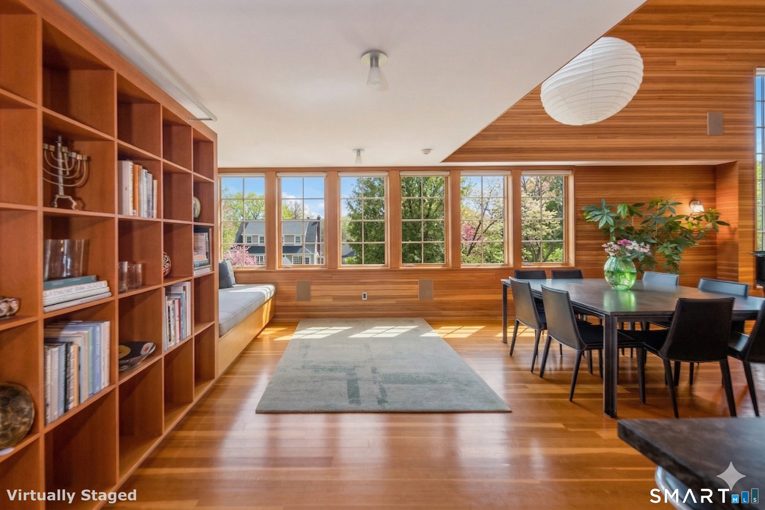 61 Hartford Avenue Madison, CT 06443 - Photo 19 of 75 a view of a dining room with furniture window and wooden floor