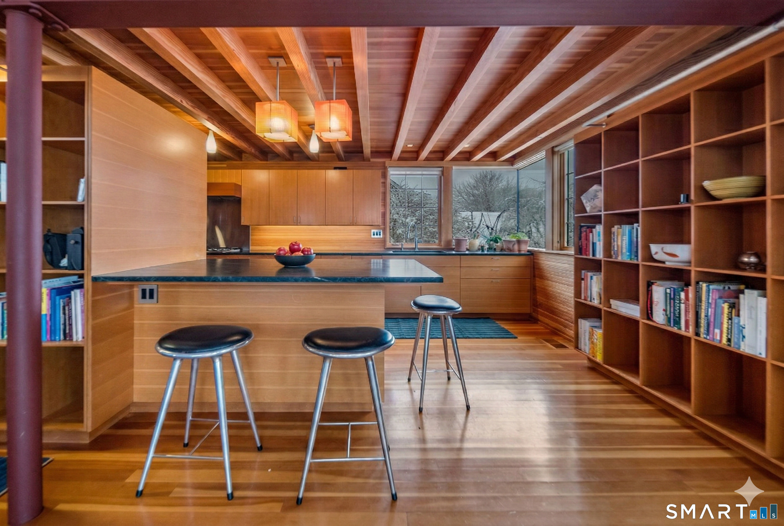 61 Hartford Avenue Madison, CT 06443 - Photo 26 of 75 a dining room with a table and chairs