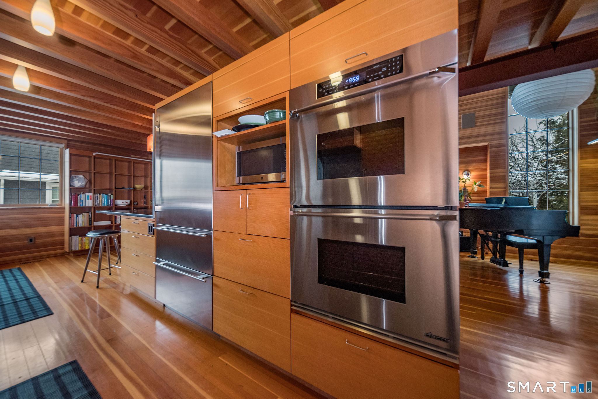 61 Hartford Avenue Madison, CT 06443 - Photo 29 of 40 a view of a chairs and table in a patio