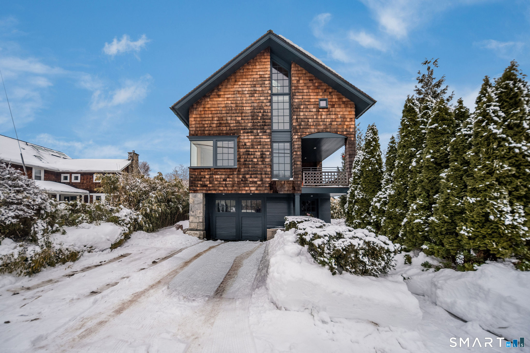 61 Hartford Avenue Madison, CT 06443 - Photo 4 of 75 a view of a house with a yard